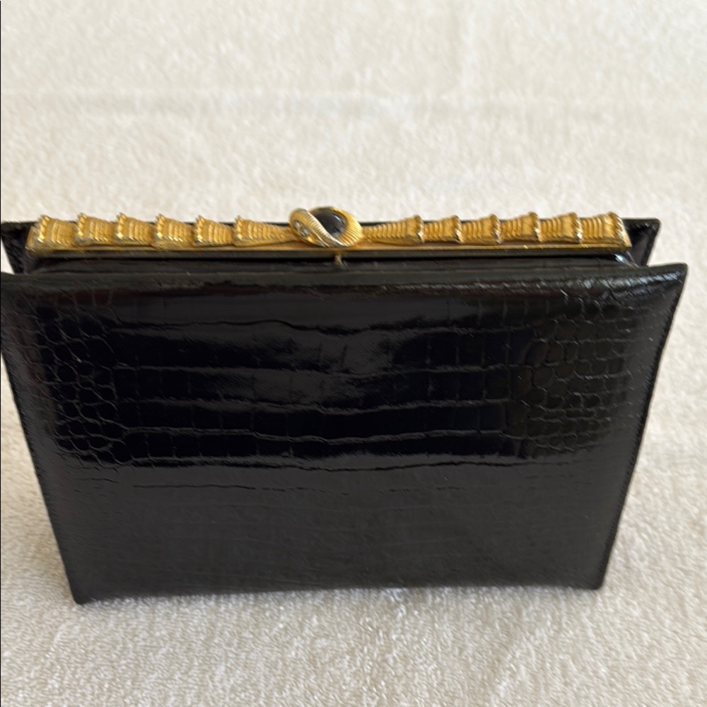 Elegant Black Clutch with Gold Accent